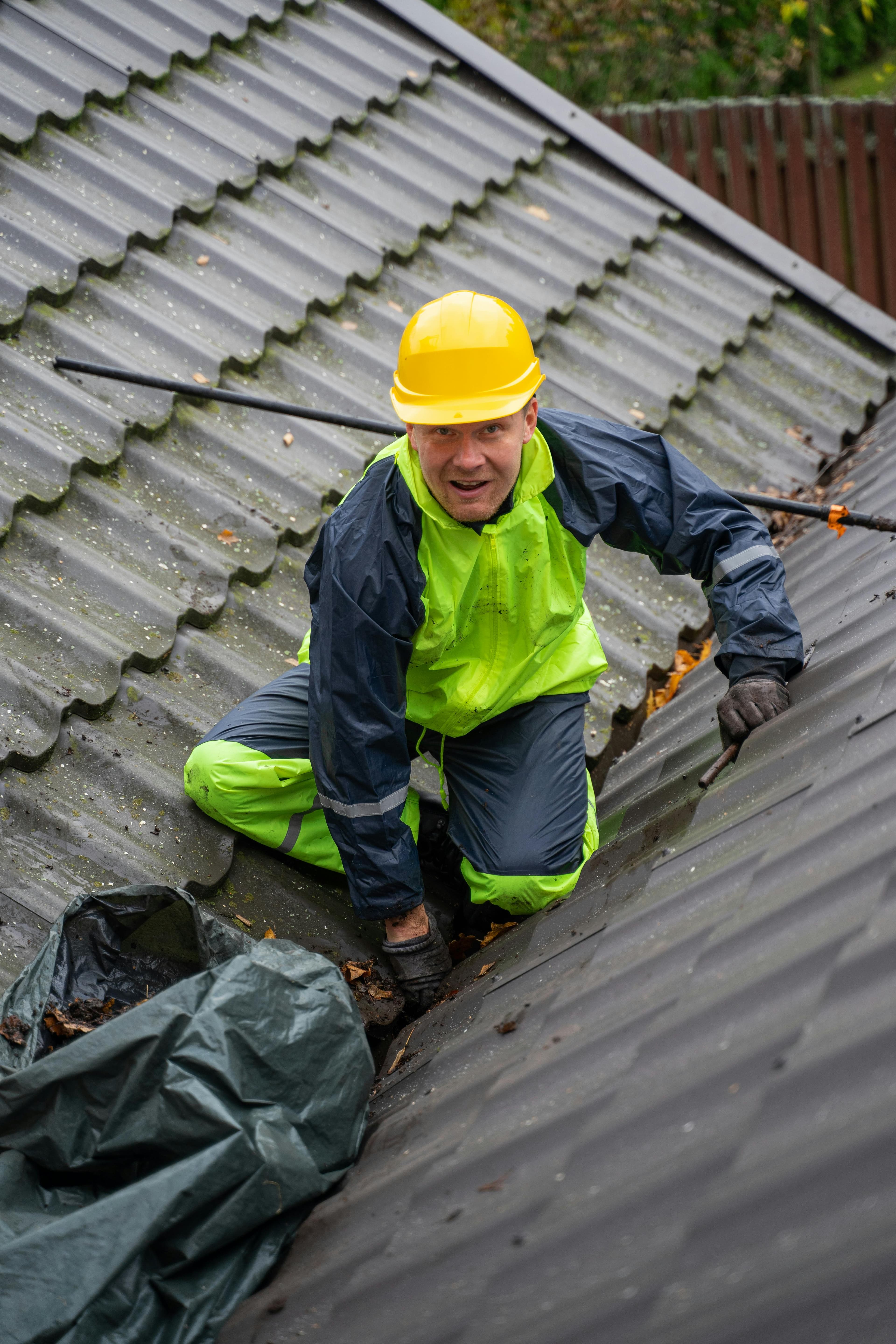 Roofing professional working on a rooftop